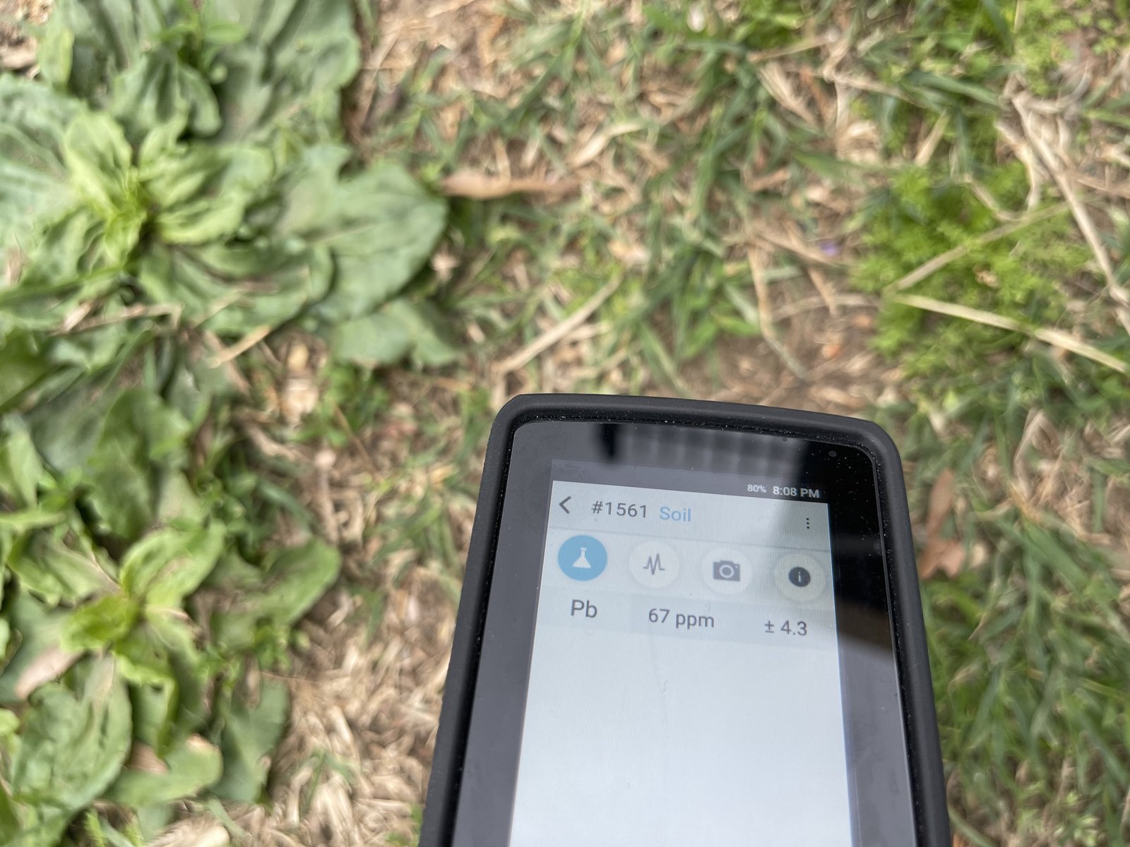 Handheld XRF analyzer reading lead in the field
